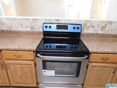 NEW COUNTERTOPS, BACKSPLASH AND STOVE.