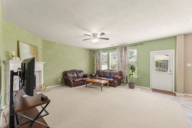 Great Family Room Area Featuring Ample Natural Lig