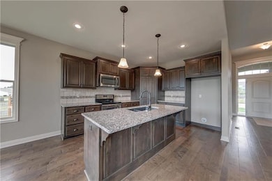 421 Meadowlark Dr, Raymore, MO 64083 - photo 4