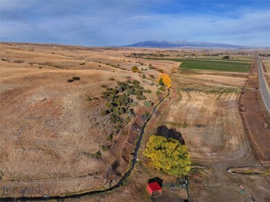 Bird's eye view featuring a mountain view and a ru