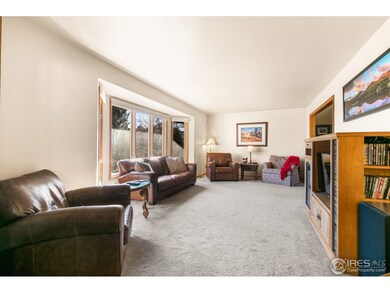 Expansive formal living with bright bay window