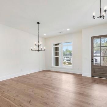 With a free-flowing space between the kitchen and great room, the casual dining area is the perfect setting to relax