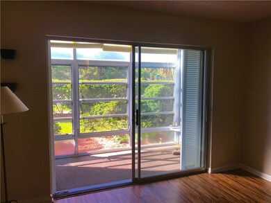 Sliders leading out to enclosed patio area.