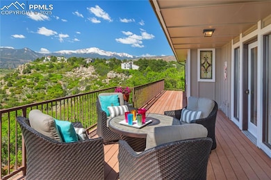 Breathtaking, elevated Pikes Peak views are yours to enjoy from this wonderful Pinecliff ranch retreat.