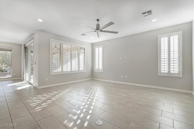 Empty room featuring ceiling fan, recessed lightin
