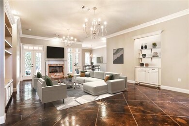 Staged Photo. See photos 6 and 7 for actual  livin
