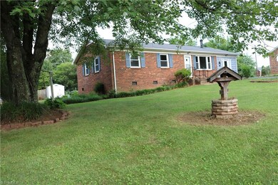 Side angle showing front yard