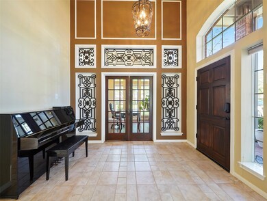 2-story entry features tile flooring with study off to the right
