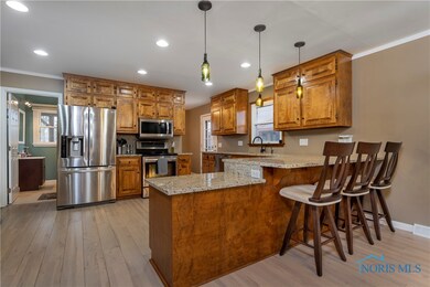 Open, Inviting, & Warm...The Upgraded Kitchen Is T