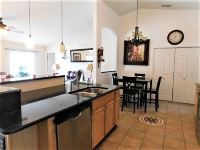 KITCHEN WITH GRANITE COUNTERS