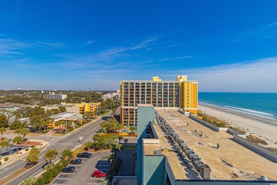 Bird's eye view featuring a beach view and a water