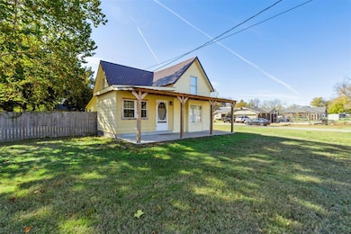 View of front of home with a metal roof