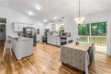 Kitchen featuring appliances with stainless steel