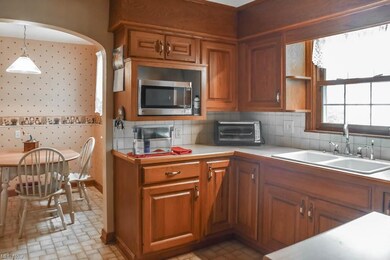 Kitchen opens to a breakfast nook.