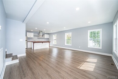 living room with vinyl flooring
