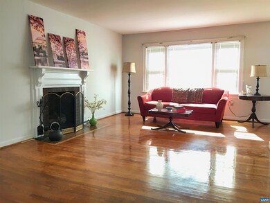 Large and open living room with lots of natural li