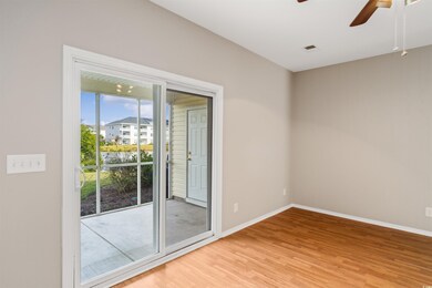 Unfurnished room featuring hardwood / wood-style f