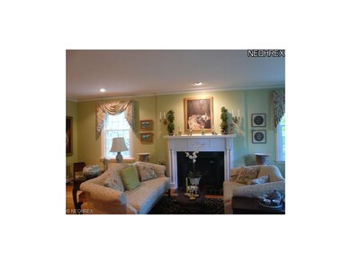 Beautiful fireplace and hardwood floors highlight 