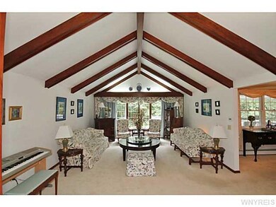 Living Room Handsome teak wood beams with lighted 