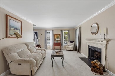 Carpeted living room with great natural light, woo