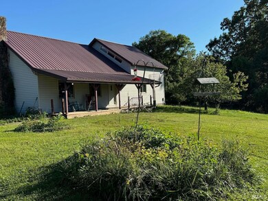 House seen from driveway.