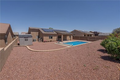 View of pool featuring a fenced backyard and a pat