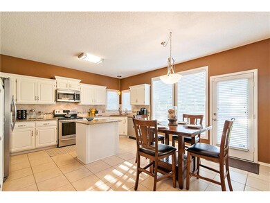 Beautiful and bright kitchen has an eat-in area, p