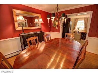 Dining Room - Warm and freshly painted, with crown