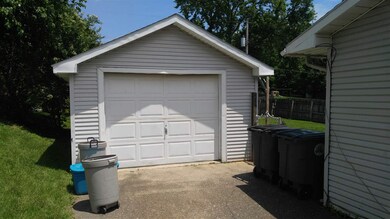 Garage with lean to shed on back.