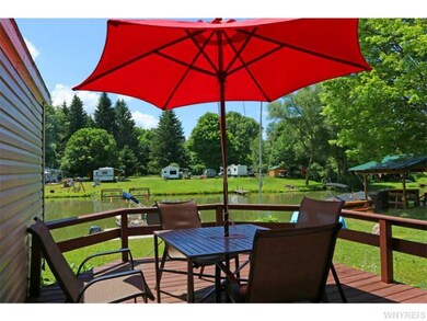 Exterior Front. patio furniture and gas grill incl