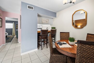 The dining room has extra bar height seating overl
