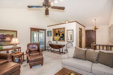 VAULTED TEXTURED CEILINGS, NEUTRAL WALL TONES