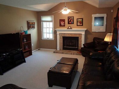 Family Room. Vaulted ceiling and gas fireplace rou