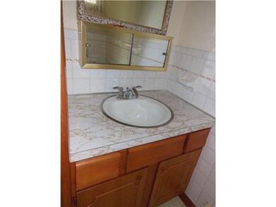 Bathroom. 1/2 bath off family room.