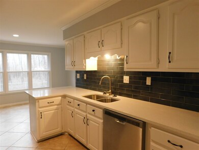 Updated with granite and stainless appliances.