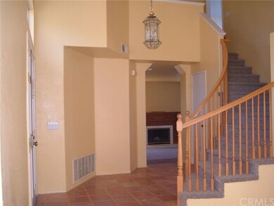 Double door entry, terra cotta tile, brand new car