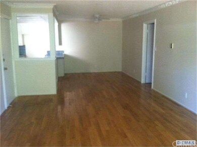 Entry, kitchen, and dining. Entry to the hallway.