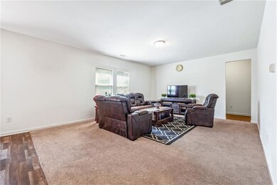 Living room with dark carpet