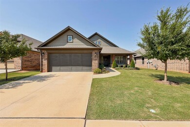 View of front of property with a garage and a fron