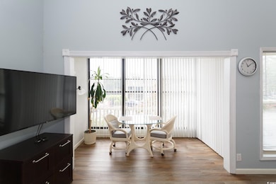 Dining area with wood finished floors