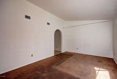 Unit 4 LR-New Flooring Coming Soon