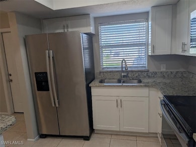 Kitchen featuring appliances with stainless steel