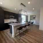 Kitchen with pendant lighting, stainless steel mic