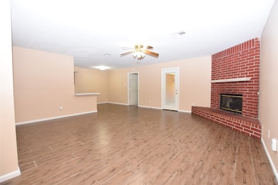 This expansive living room seamlessly integrates w