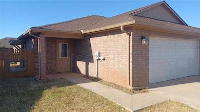 View of property exterior featuring a garage