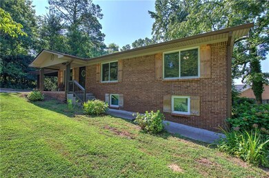 Front porch with steps and sidewalk to side yard