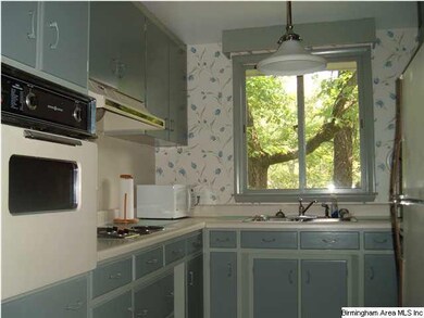 Kitchen so convenient with breakfast bar.