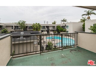 Balcony overlooking pool