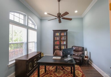 off foyer to left w/ french doors