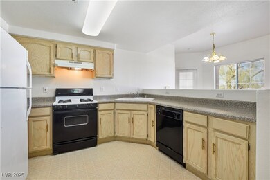 Kitchen with range with gas stovetop, dishwasher,
